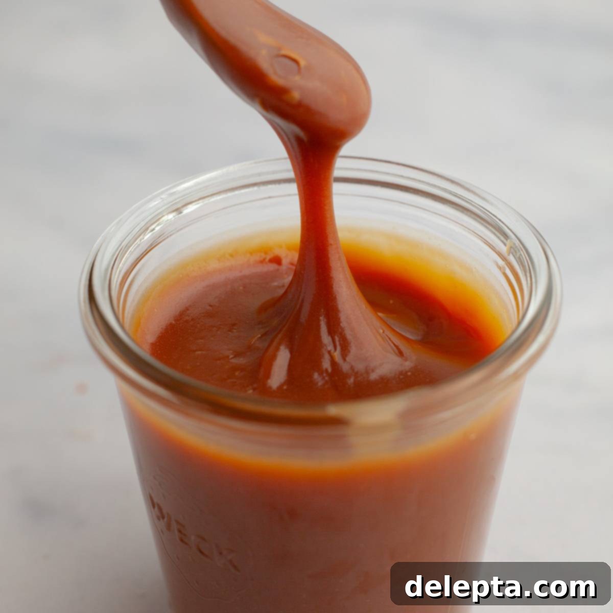 Decadent Homemade Salted Caramel Sauce 1 featured 13266