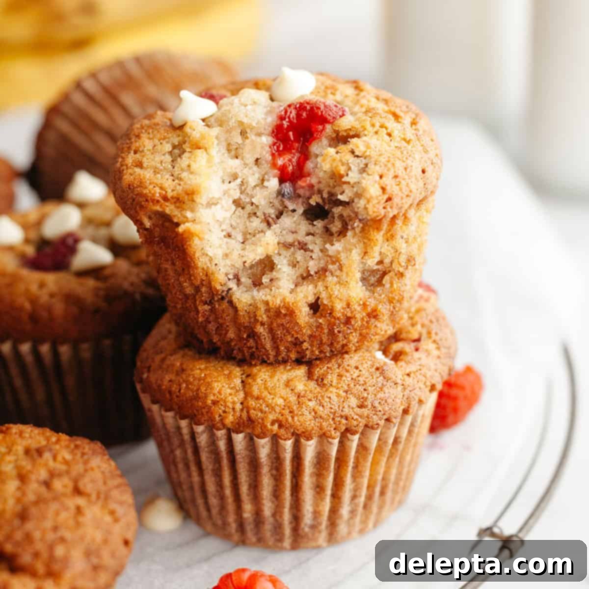 Effortless Banana Raspberry White Chocolate Chip Muffins 1 featured 18810