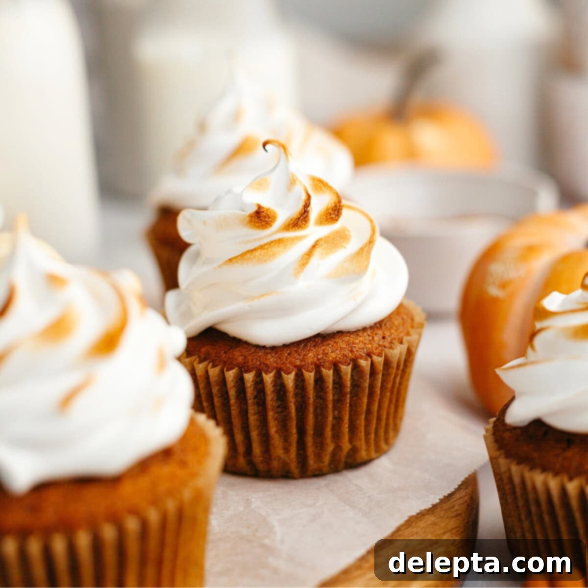 Spiced Pumpkin Cupcakes with Whipped Marshmallow Frosting 1 featured 22054