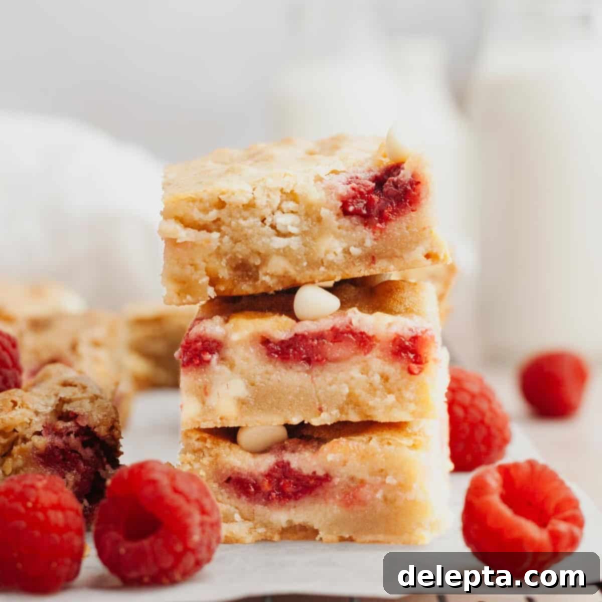 Decadent Raspberry White Chocolate Blondies 1 featured 7182