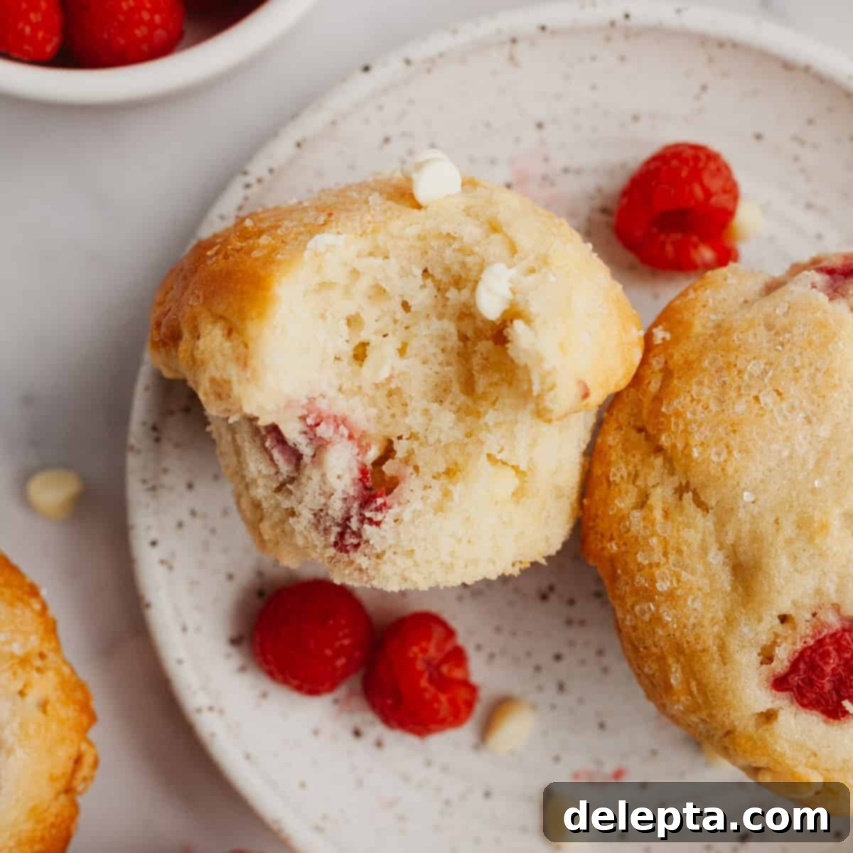 Decadent Raspberry White Chocolate Muffins 1 featured 7246