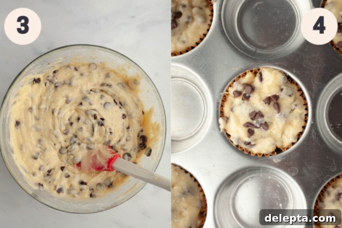 Mile-High Chocolate Chip Muffins 5 A bowl of chocolate chip muffin batter ready for baking, next to a muffin tin filled with unbaked muffins, topped with extra chocolate chips.