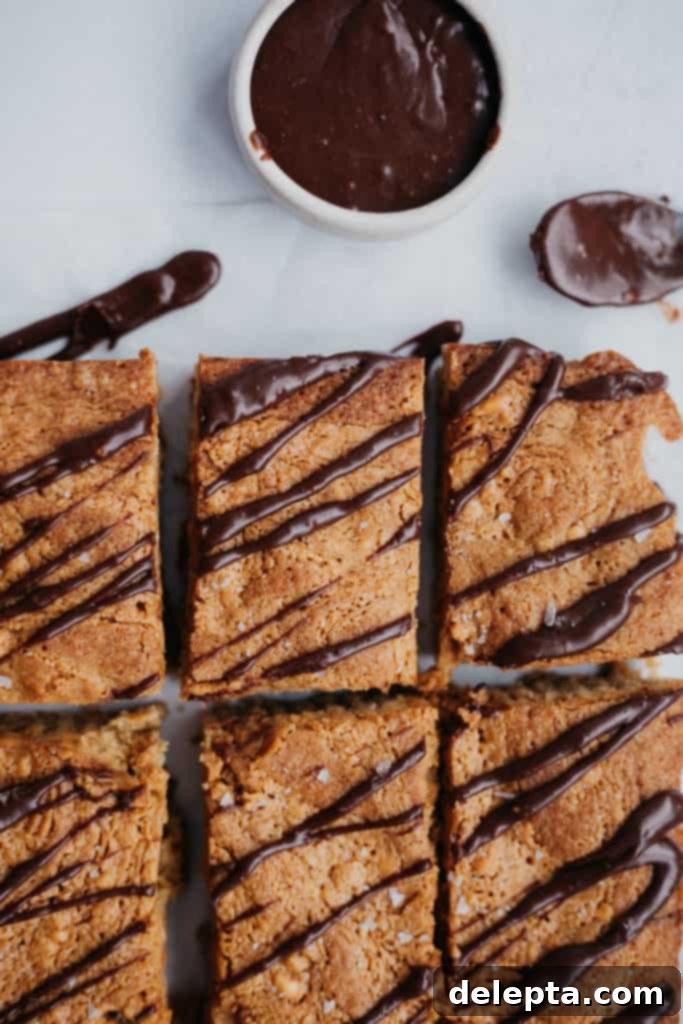 Java Peanut Butter Crunch Blondies 2 a close up of six coffee peanut butter crunch blondies with mocha drizzle