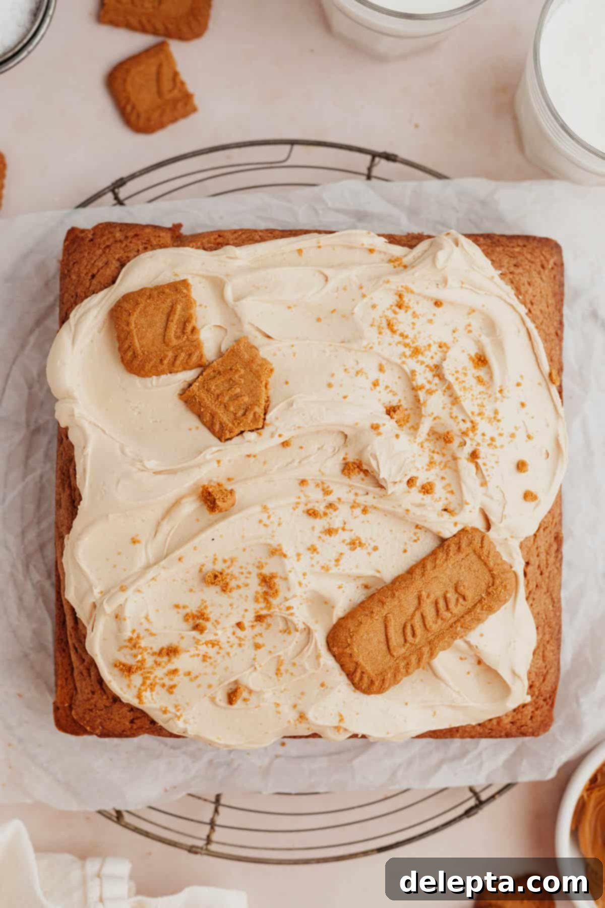 Dreamy Biscoff Buttercream Just 5 Ingredients 5 A square sheet cake covered in a beige frosting and decorated with Biscoff cookies.