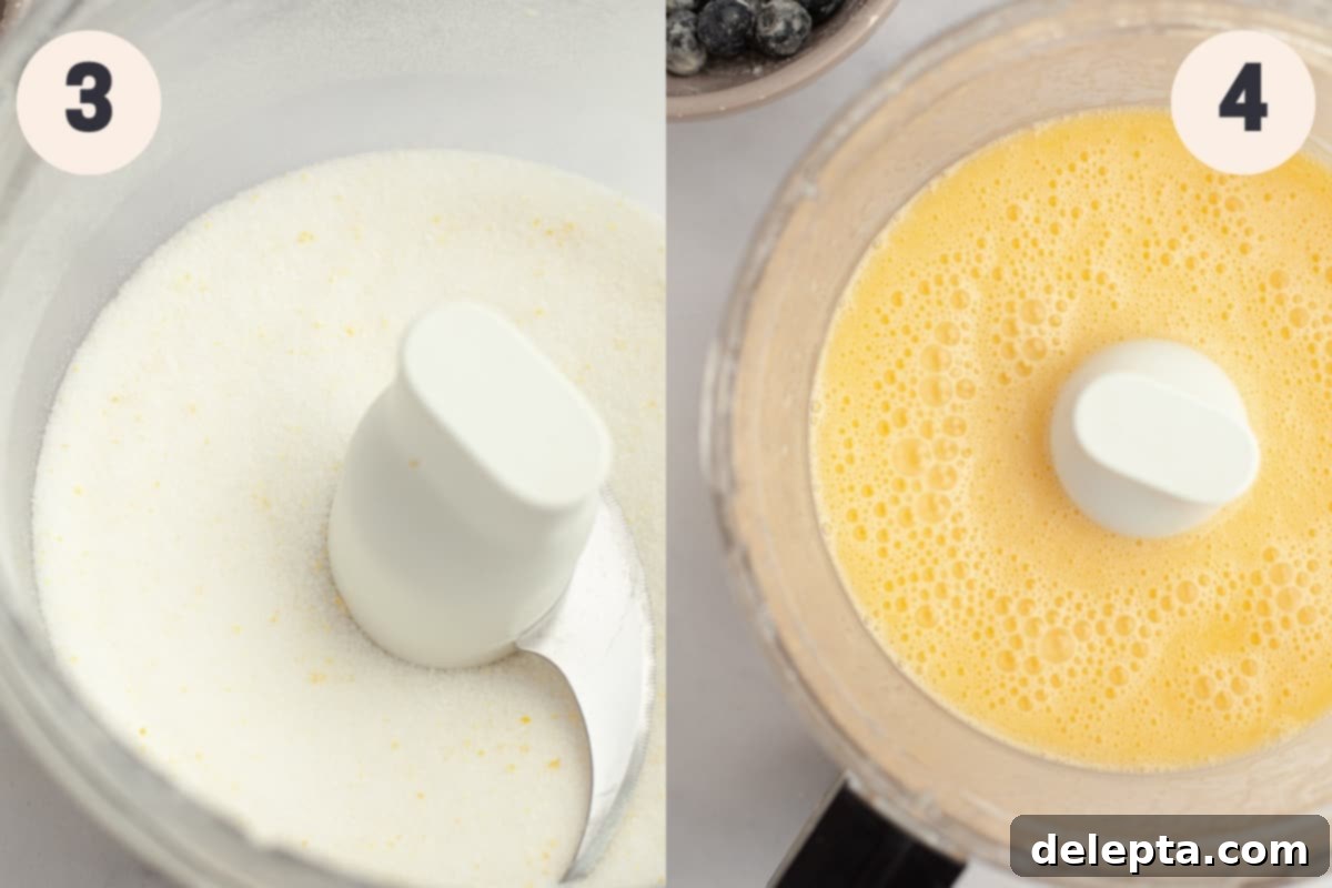 Heavenly Blueberry Pound Cake 5 A food processor containing cake batter, illustrating the blending of wet ingredients.