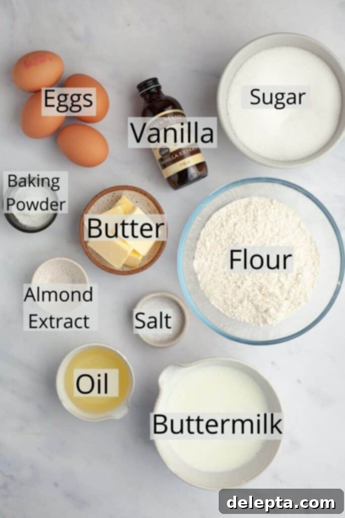 Golden Vanilla Treat with Chocolate Bliss 3 All the precisely measured ingredients for the vanilla cake, neatly arranged in small bowls, ready for baking.
