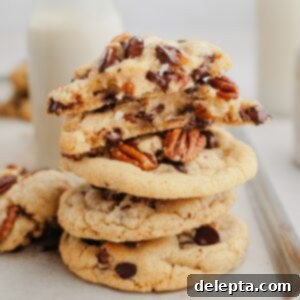 Decadent Chocolate Pecan Cookies 9 A stack of pecan chocolate chip cookies.