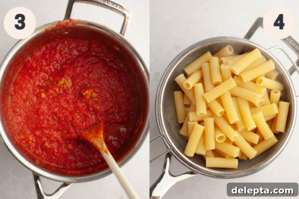 Hearty Three-Cheese Baked Rigatoni with Savory Sausage 5 A large saucepan with rich red tomato sauce simmering and a sieve with cooked rigatoni pasta.