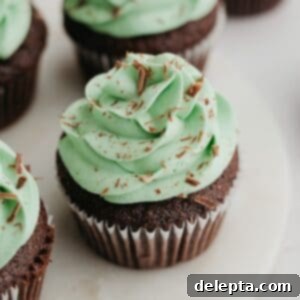 Simple Mint Chocolate Delights 10 Chocolate cupcakes with vibrant green mint frosting, ready to be enjoyed.