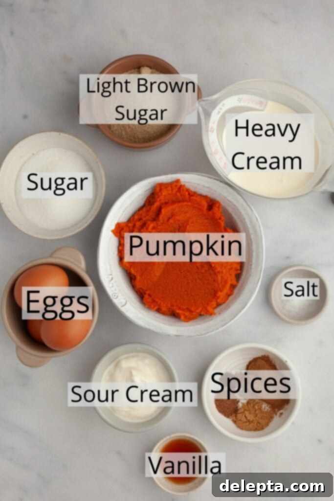 Graham Cracker Crust Pumpkin Pie 3 All the ingredients needed to make a pumpkin pie, weighed out into small bowls.