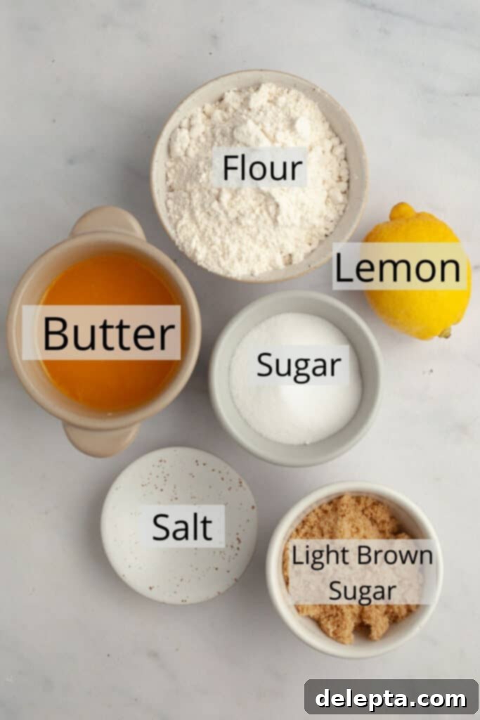 Pratik ve Enfes Yaban Mersinli Limonlu Kahve Keki 4 A selection of ingredients specifically for making the lemon crumb topping, arranged in small bowls.