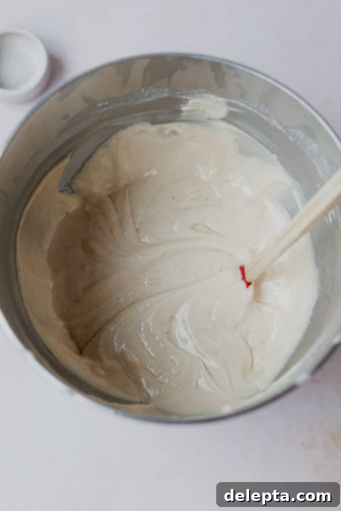 Vanilla Dream Doughnuts with a Raspberry Kiss 3 Overhead view of a mixing bowl with doughnut batter