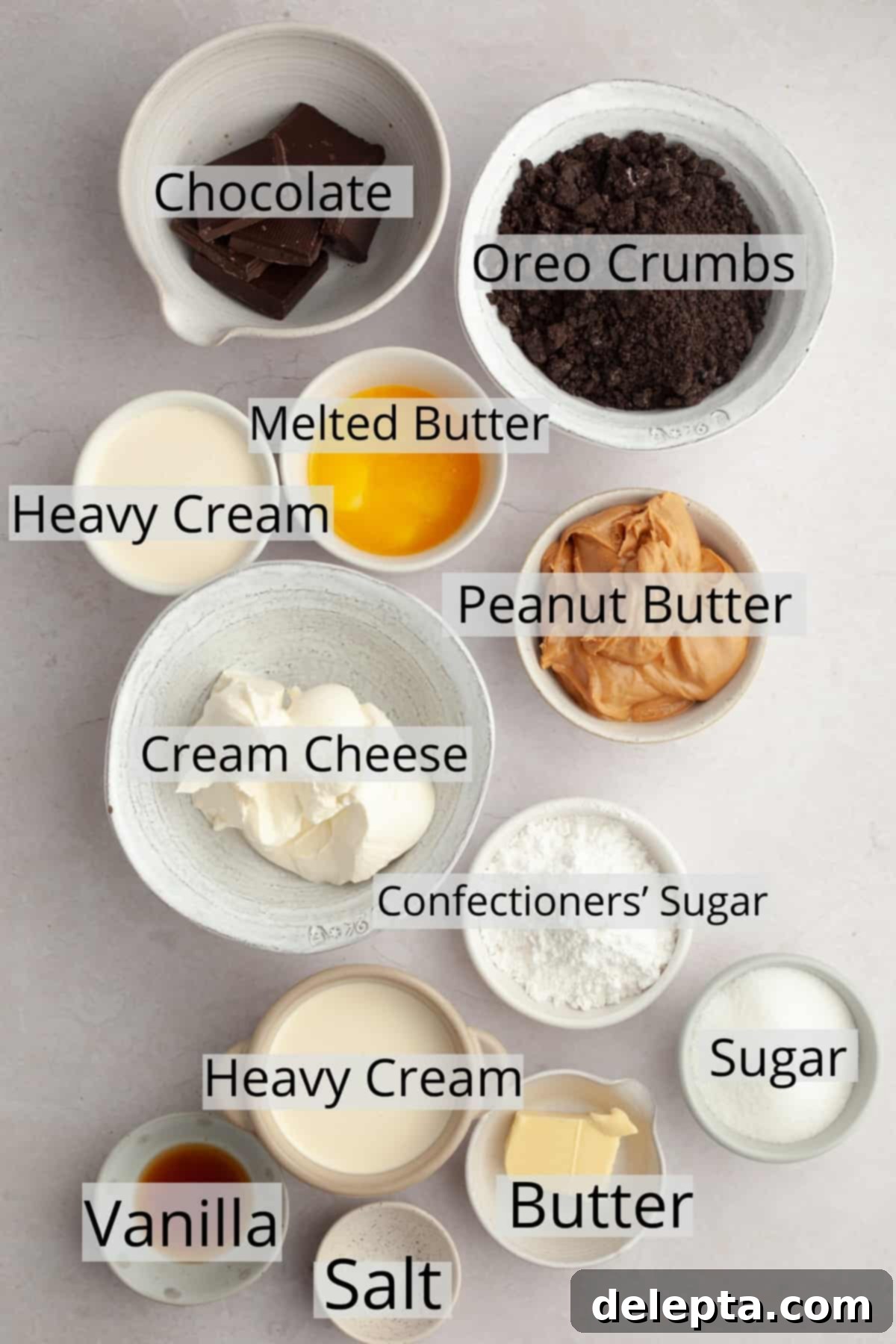 Decadent No-Bake Oreo Peanut Butter Pie 3 All the meticulously weighed ingredients for the Oreo peanut butter pie laid out in small bowls, ready for preparation.
