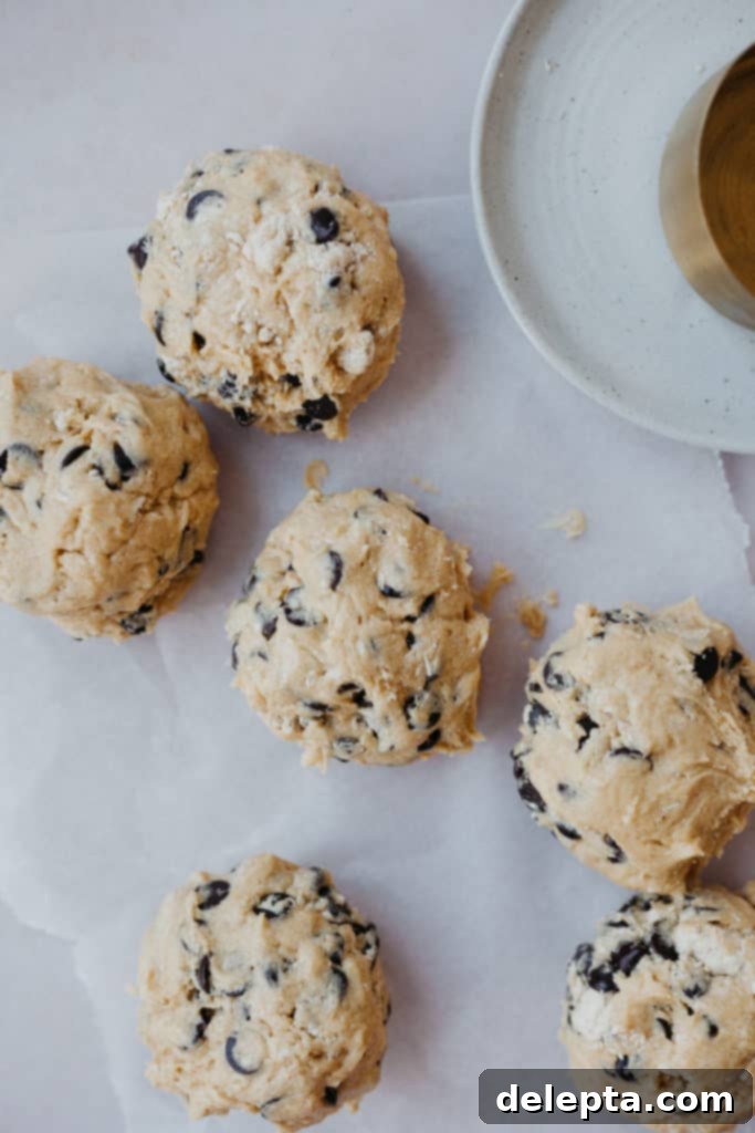 Halva Chocolate Chip Cookie Giants 7 Six large, unbaked balls of chocolate chip halva cookie dough, perfectly rounded and ready for chilling.