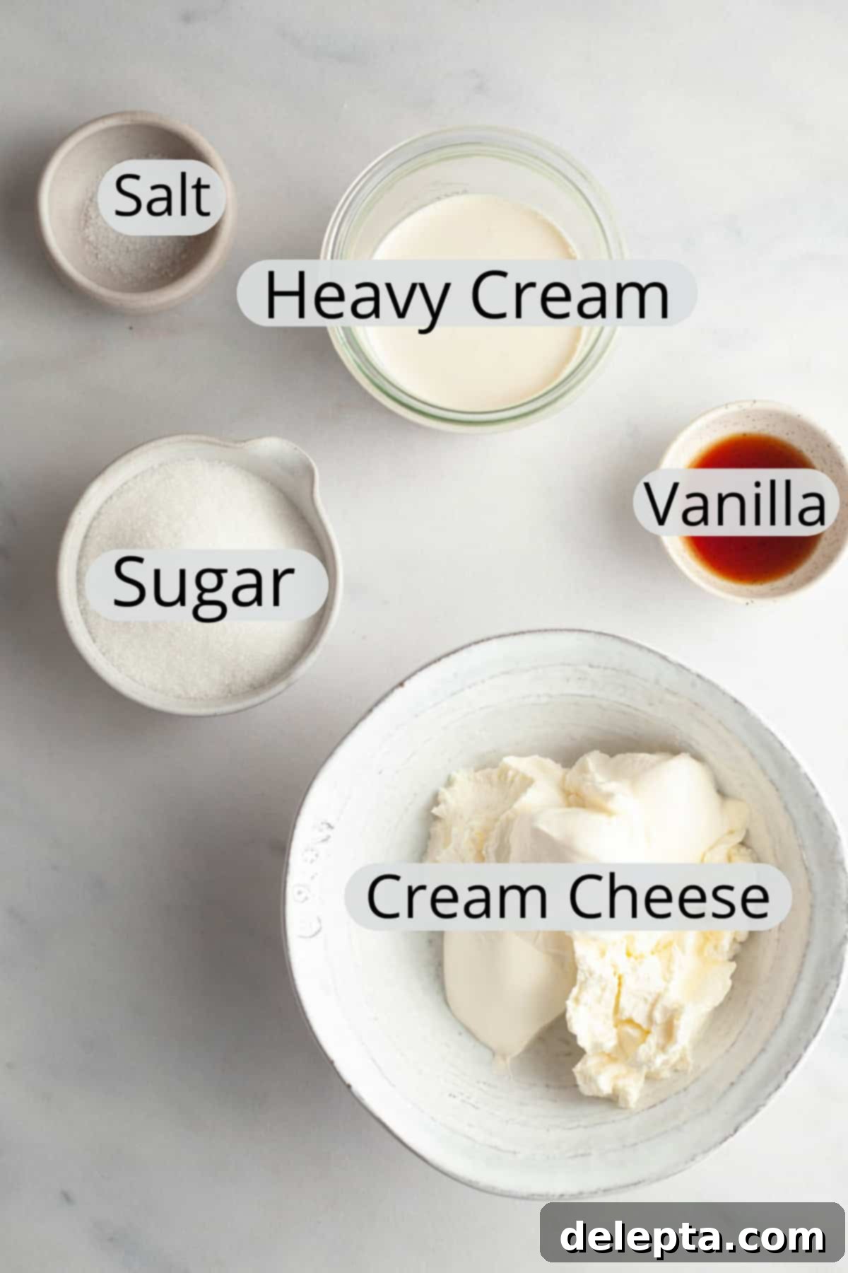 Perfect Butter-Free Cream Cheese Frosting in Minutes 3 Ingredients needed to make cream cheese frosting without butter, weighed out into small bowls.