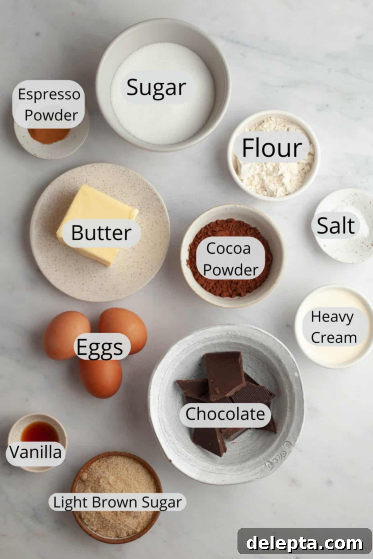Decadent Fudgy Brownies with Velvety Chocolate Ganache 3 Assortment of brownie ingredients including chocolate, cocoa powder, sugar, and eggs