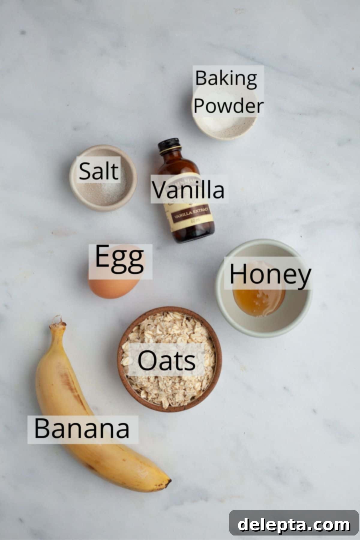 Single-Serve Baked Oat Indulgence 3 All the ingredients needed for baked oats for one weighed out in small bowls.