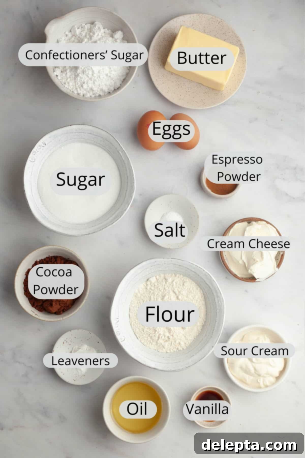 Decadent Chocolate Cream Cheese Cupcakes 3 All the ingredients needed to make chocolate cupcakes with chocolate cream cheese frosting, neatly weighed out into small bowls.