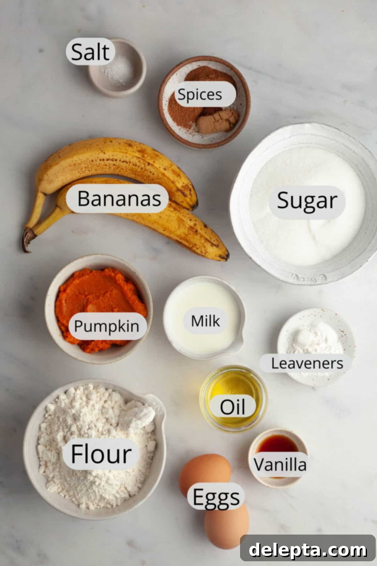 Effortlessly Moist Pumpkin Banana Muffins 3 All the ingredients needed to make pumpkin banana muffins, weighed out into small bowls.