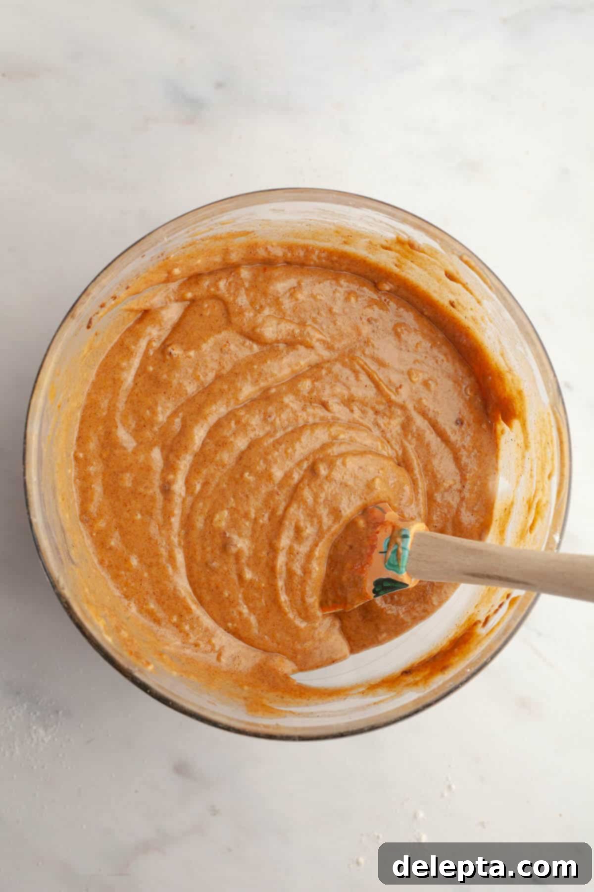 Pumpkin Spiced Latte Cake Bake 5 Pumpkin spice latte cake batter in a bowl, after dry ingredients have been added and just combined.