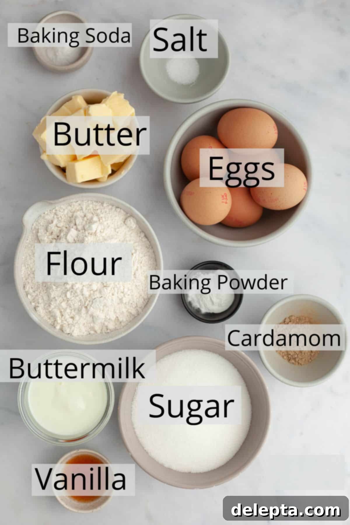 Brown Butter Cream Cheese Cardamom Cake 3 All the ingredients needed to make a cardamom cake weighed out into small bowls, ready for baking.