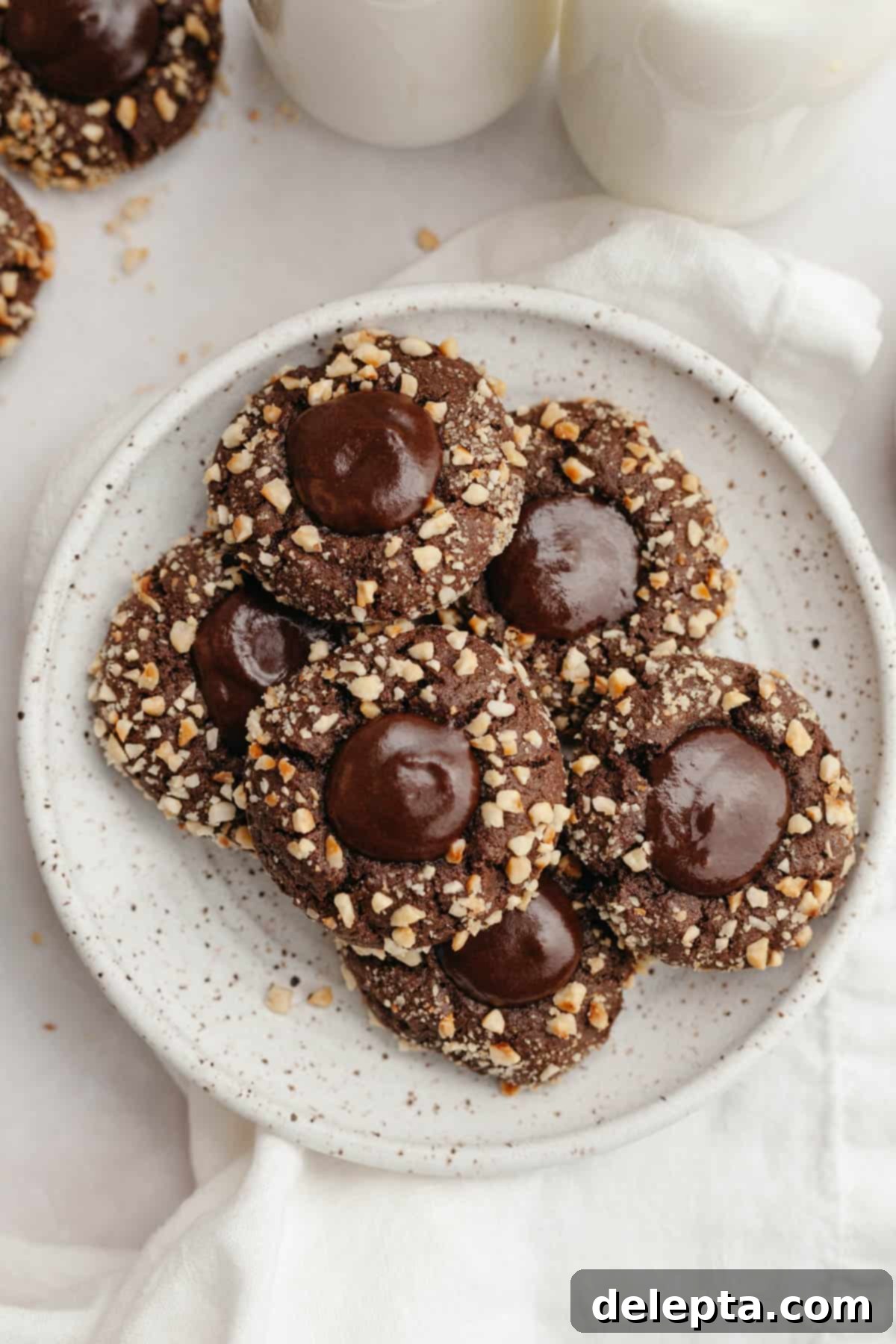 Double Nutella Bliss: Easy Thumbprint Cookies with Ganache 12 A beautifully arranged plate featuring finished Nutella thumbprint cookies.
