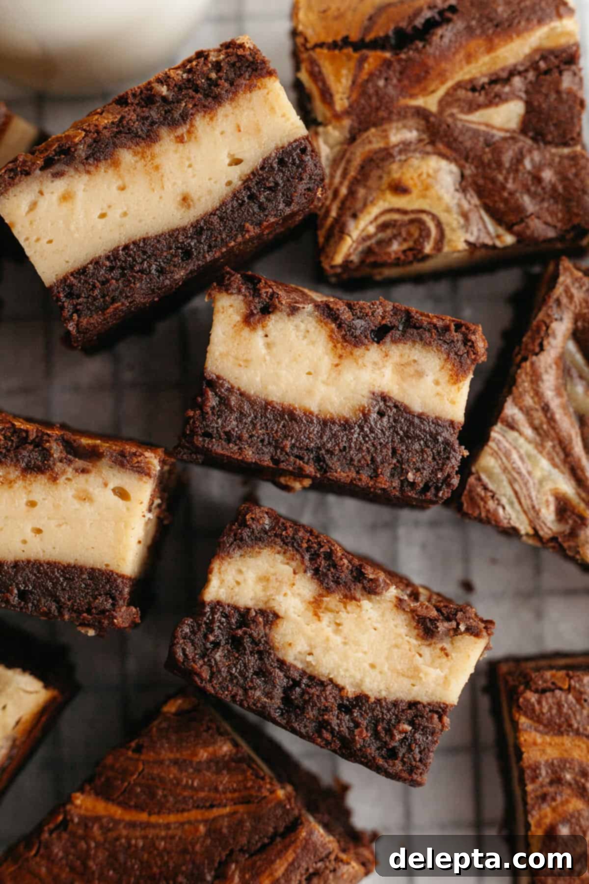 Decadent Peanut Butter Cream Cheese Swirl Brownies 12 A close up of perfectly swirled peanut butter cream cheese brownies, showing the rich chocolate and creamy peanut butter layers.
