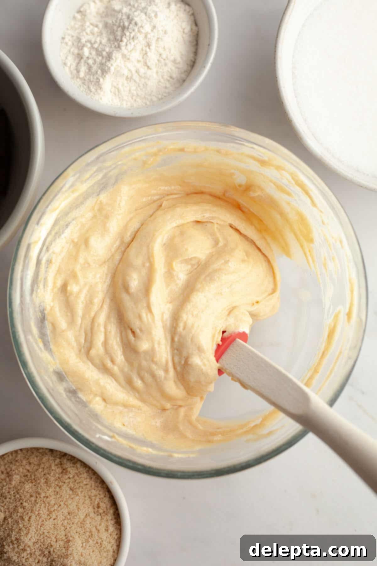 Decadent Peanut Butter Cream Cheese Swirl Brownies 4 Peanut butter cheesecake filling in a bowl, smooth and creamy.