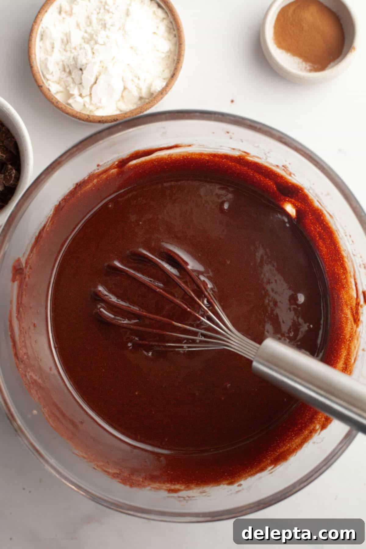 Easy One-Bowl Fudgy Espresso Brownies 6 A glass bowl with brownie batter in it.