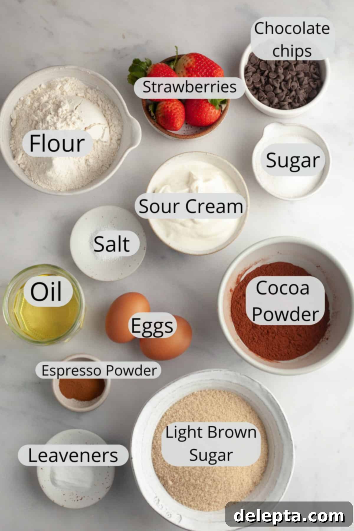 Decadent Double Chocolate Strawberry Muffins 3 All the ingredients needed to make moist strawberry chocolate muffins, carefully weighed out into small bowls.