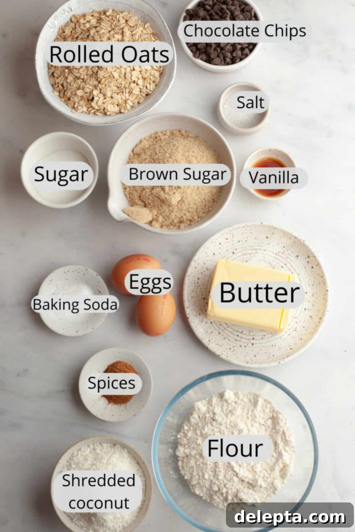 Brown Butter Oatmeal Cookies with Chocolate Chips and Coconut 3 Ingredients needed to make coconut chocolate chip oatmeal cookies, carefully weighed out into small bowls, ready for baking.
