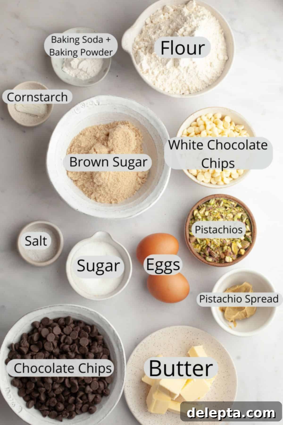 Pistachio Stuffed Chocolate Chip Delights 3 All the meticulously weighed ingredients laid out in small bowls, including whole and chopped pistachios, chocolate chips, butter, and sugar, ready for making pistachio chocolate chip cookies.