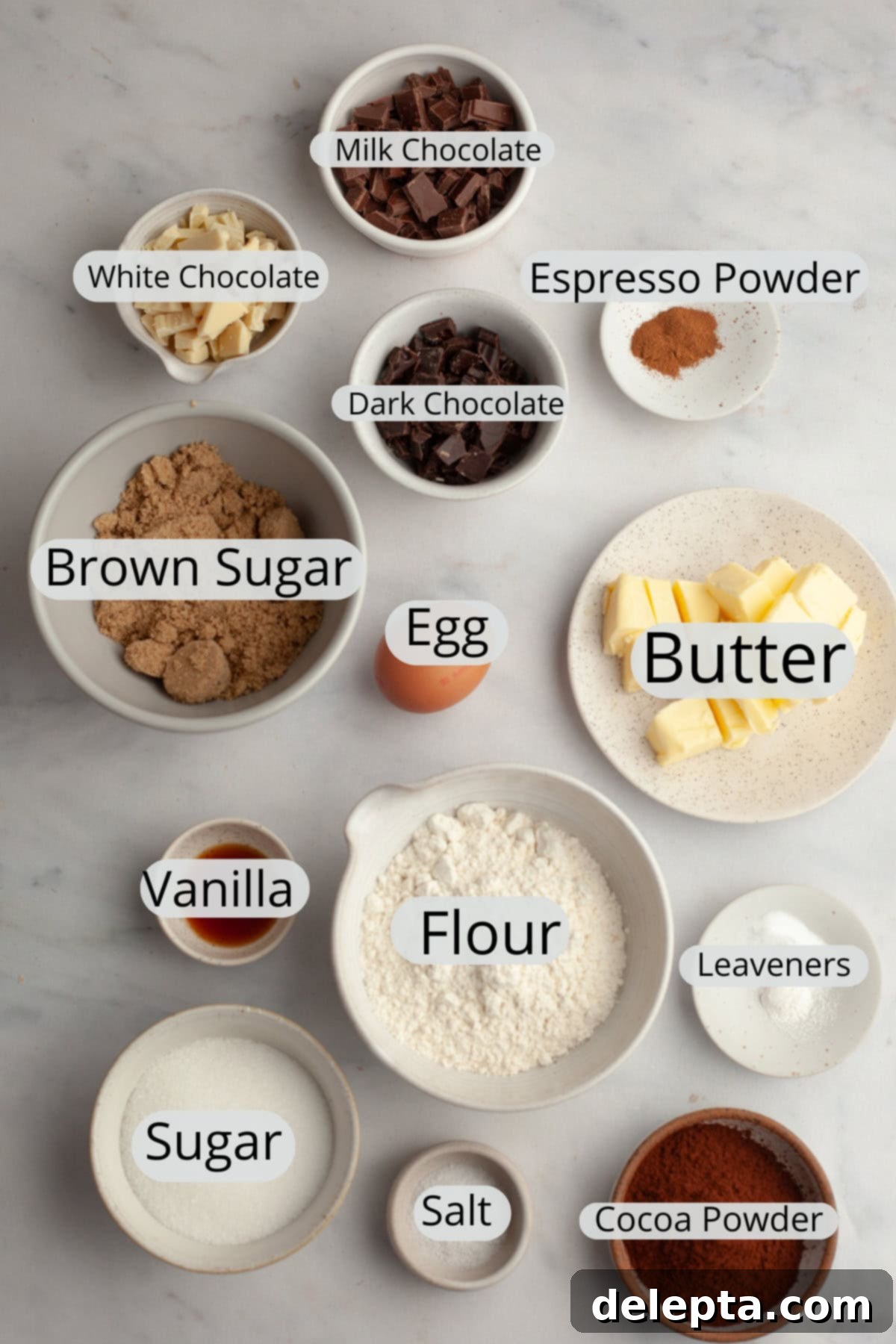 Chewy Triple Chocolate Chunk One Bowl Cookies 3 All the essential ingredients meticulously weighed out into small bowls, ready for making triple chocolate chunk cookies.