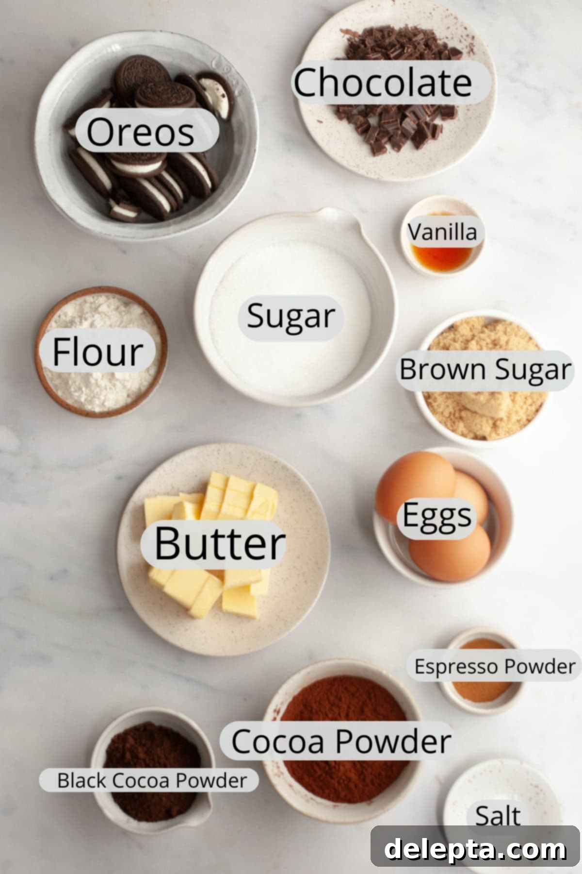 One-Bowl Decadence: Oreo Fudge Brownies 3 All the precisely weighed ingredients needed to make rich Oreo brownies, laid out in small bowls.