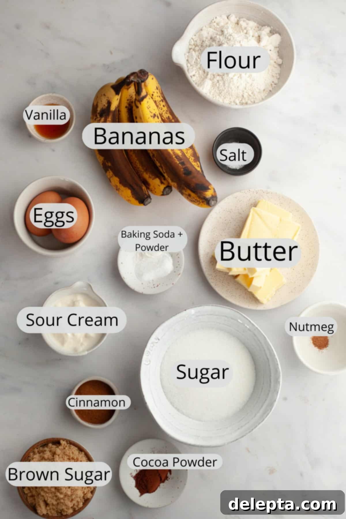 Perfectly Moist Banana Coffee Cake with Tangy Sour Cream 3 All the ingredients needed to make banana coffee cake, meticulously weighed out into small bowls, ready for baking.