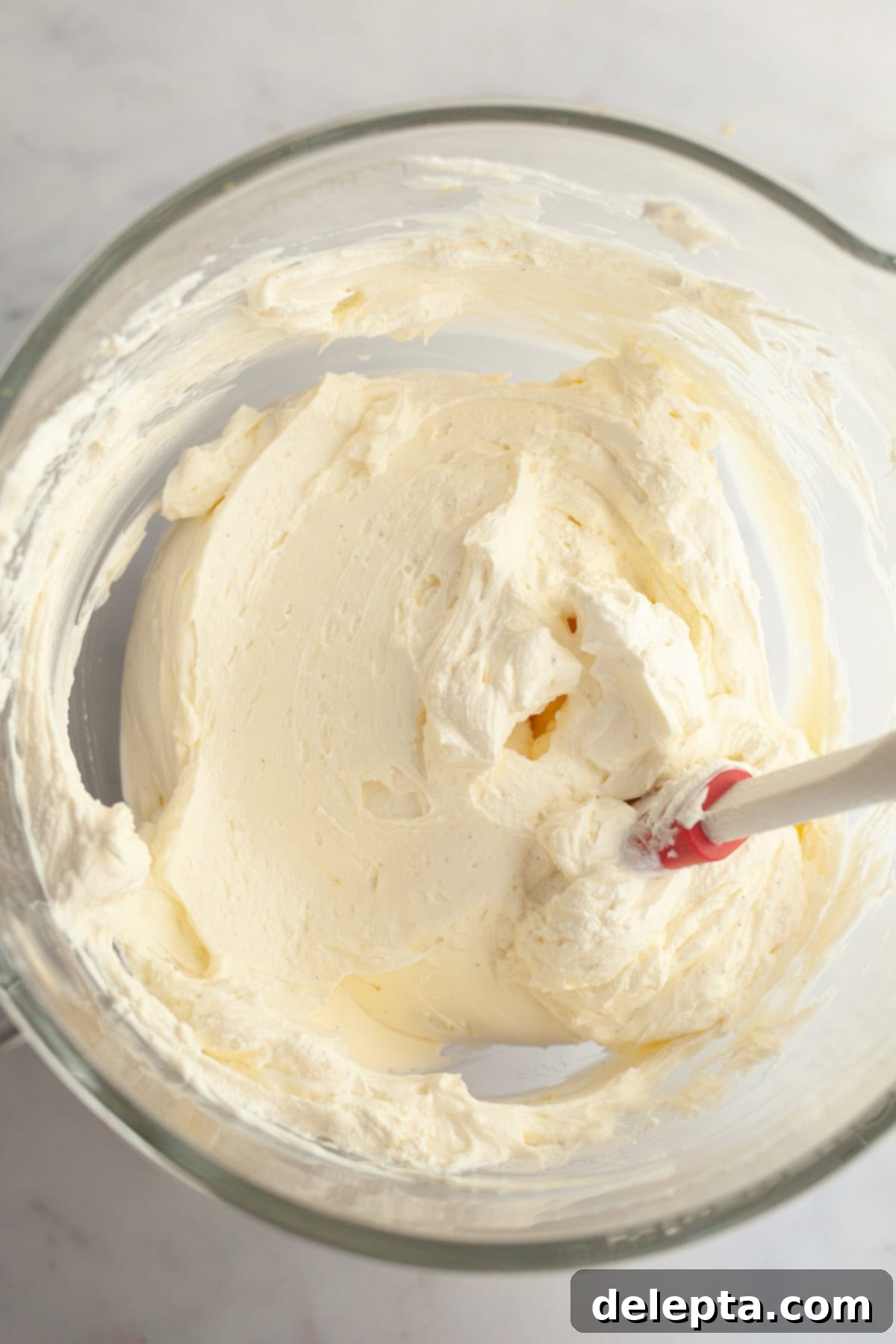 Gelatin-Free No-Bake Vanilla Cheesecake 7 Vanilla cheesecake filling in a glass bowl.