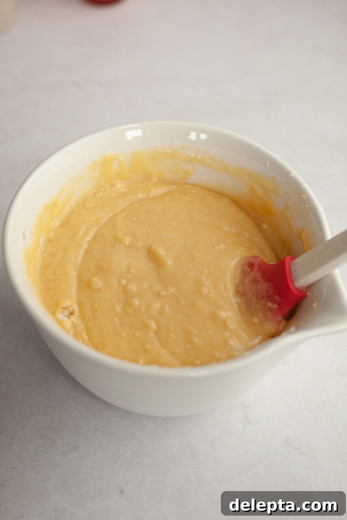 Velvet Cinnamon Pound Cake with Espresso Maple Glaze 6 Pound cake batter in a large mixing bowl, after dry ingredients have been added and gently combined.