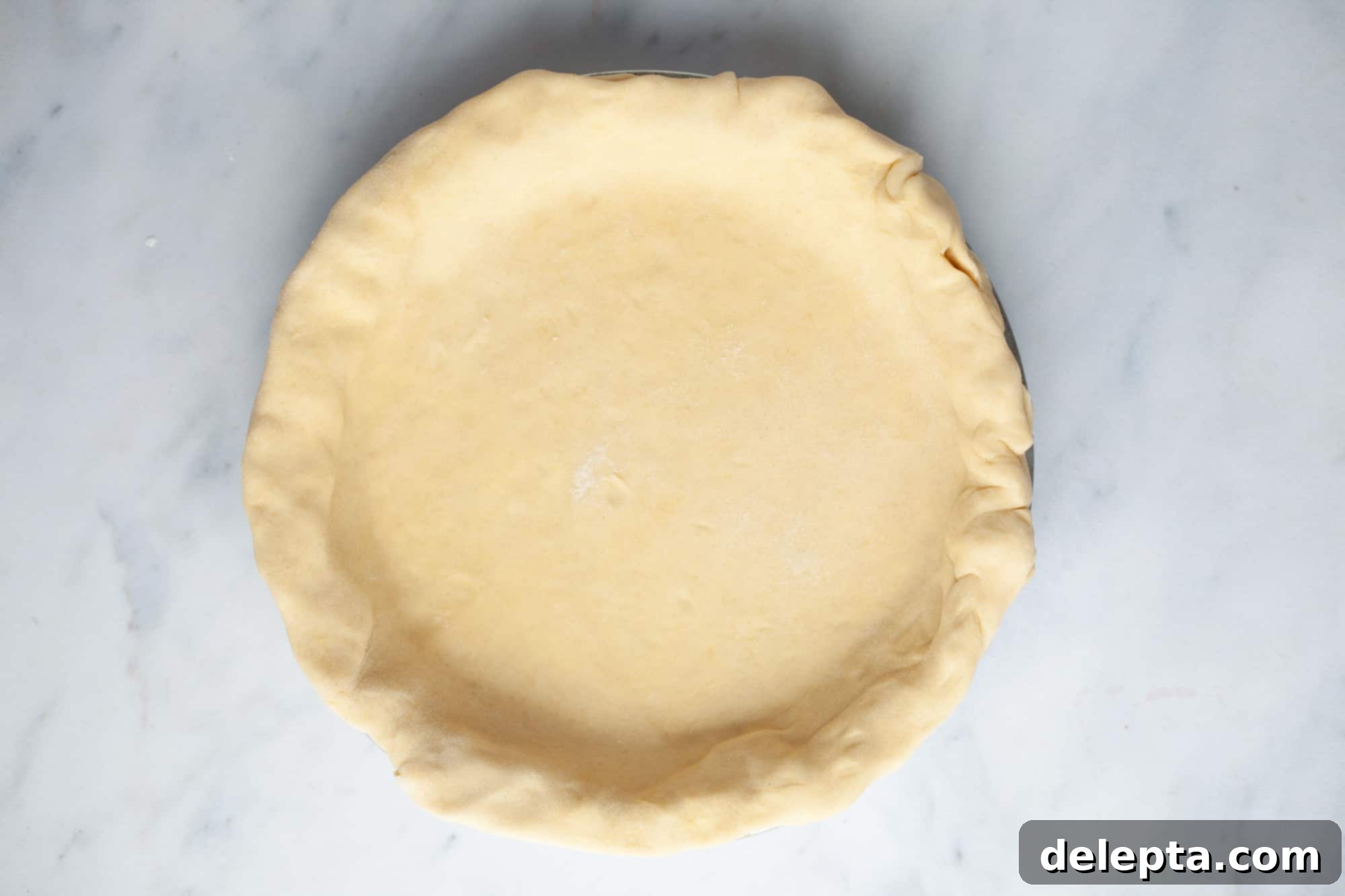 Homestyle Cherry Rhubarb Pie 9 A pie plate with pie dough