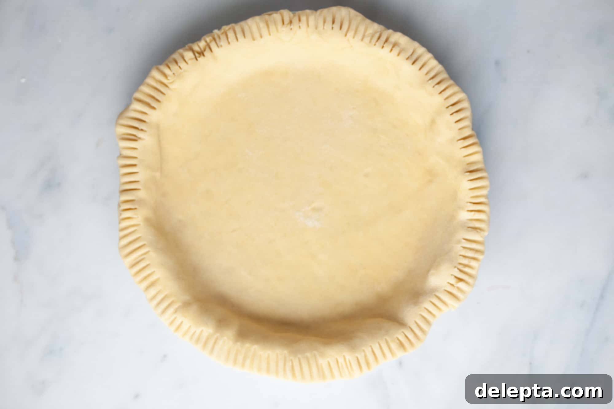 Homestyle Cherry Rhubarb Pie 10 An unbaked pie without a filling