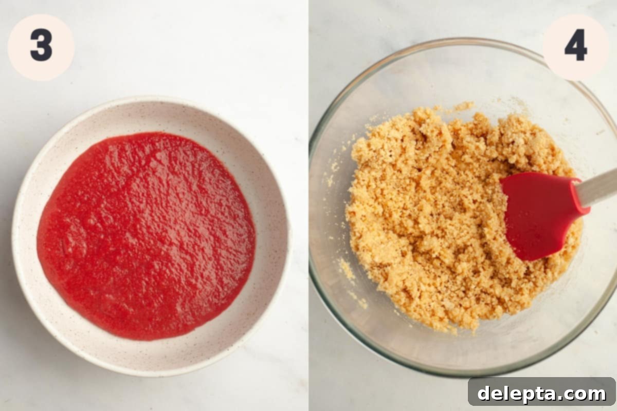 Divine No-Bake Strawberry Crunch Cheesecake 5 Reduced strawberry puree cooling in a small shallow bowl, next to a prepared cheesecake crust packed into a glass pie dish.