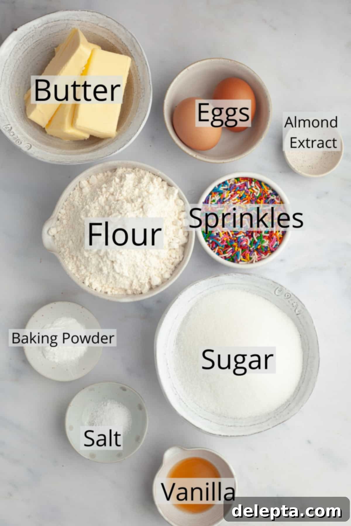 Pillowy Soft Rainbow Sugar Cookies 3 All the ingredients needed to make sugar sprinkle cookies weighed out into small bowls, ready for baking.