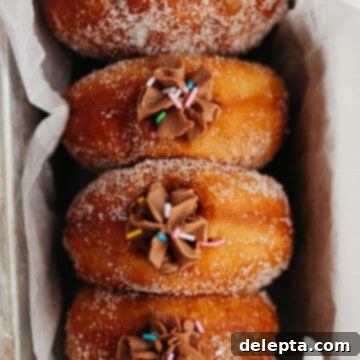 Chocolate-Stuffed Brioche Bliss 20 Four brioche doughnuts filled with chocolate filling in a loaf pan
