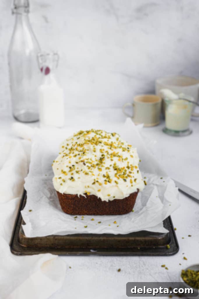Autumn Zucchini Spice Loaf with Cloud Cream Cheese Frosting 2 spiced zucchini loaf of a tray