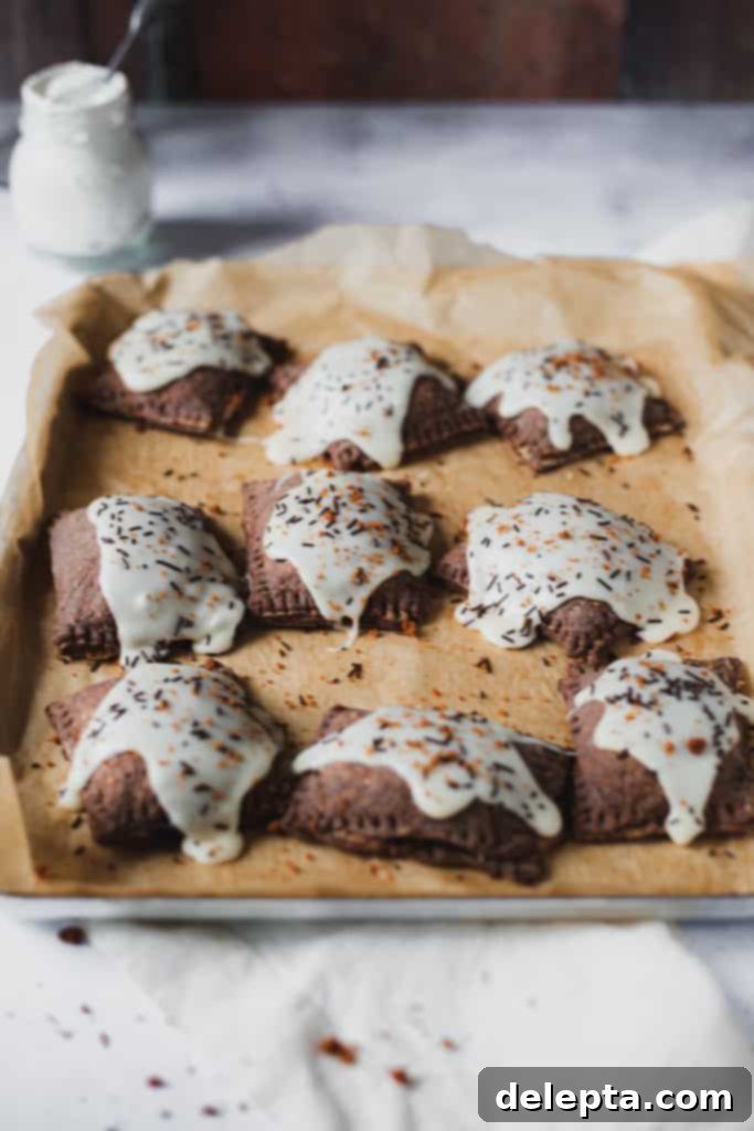S'mores Pop Tarts with Gooey Marshmallow Glaze 3 tray of smores pop tarts