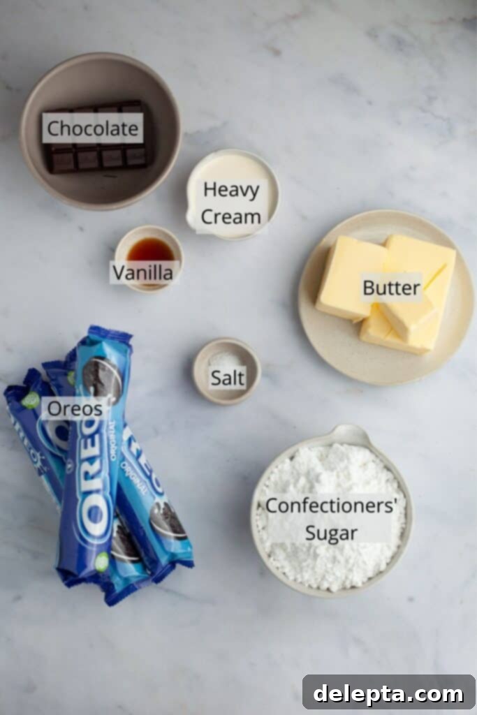 Decadent Oreo Drip Cake 4 Overhead shot of ingredients for Oreo frosting, including butter, powdered sugar, and Oreos