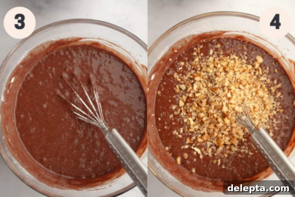Simply Divine Moist Chocolate Walnut Cake 6 A bowl filled with rich chocolate cake batter, with visible flecks of chopped walnuts mixed in.