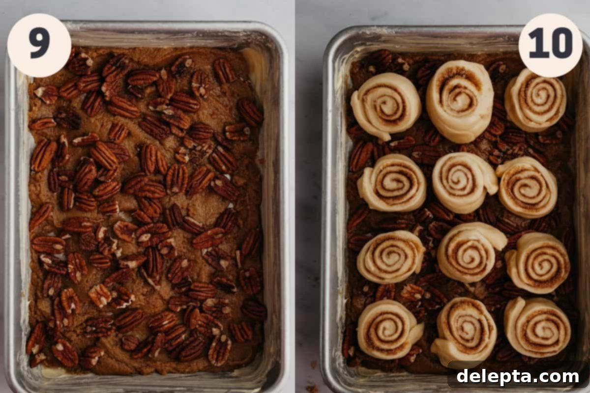 Decadent Pecan Caramel Rolls 8 A baking tray prepared with pecans and caramel mixture, followed by the unbaked cinnamon rolls neatly arranged on top of the caramel layer.