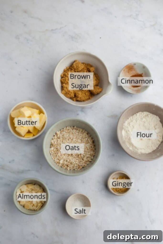 Ginger-Kissed Harvest Apple & Pear Crisp 4 Ingredients for the ginger oat topping, precisely weighed out into small bowls for baking.