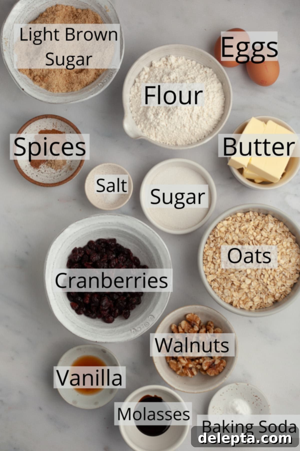 Wholesome Cranberry Walnut Oat Cookies 3 All the essential ingredients for making delicious oatmeal walnut cranberry cookies, carefully weighed out into small preparation bowls, ready for baking.