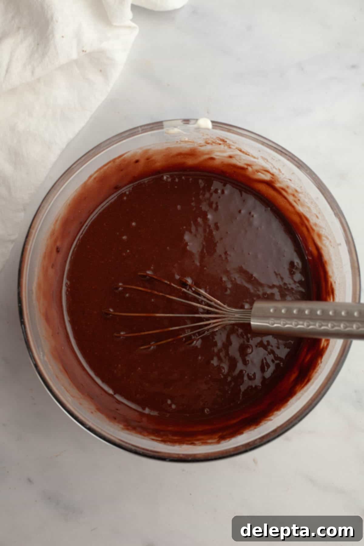 Quick Nutella-Stuffed Cupcakes 6 Chocolate cupcake batter in a bowl.